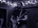 David Bazan of Pedro the Lion plays Sam Bonds Garage in Eugene in March 2010, photo by Daniel Temmesfeld, cc 2010