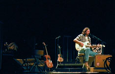 Pearl Jam Eddie Vedder ukulele songs tour in Portland 2011, photo by Daniel Temmesfeld, cc 2011