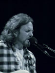 Pearl Jam Eddie Vedder ukulele songs tour in Portland 2011, photo by Daniel Temmesfeld, cc 2011