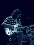 Pearl Jam Eddie Vedder ukulele songs tour in Portland 2011, photo by Daniel Temmesfeld, cc 2011