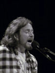 Pearl Jam Eddie Vedder ukulele songs tour in Portland 2011, photo by Daniel Temmesfeld, cc 2011