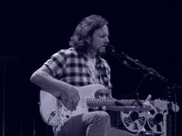 Pearl Jam Eddie Vedder ukulele songs tour in Portland 2011, photo by Daniel Temmesfeld, cc 2011