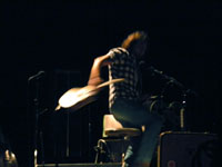 Pearl Jam Eddie Vedder ukulele songs tour in Portland 2011, photo by Daniel Temmesfeld, cc 2011