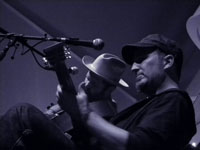 Peter Mulvey and Jeffrey Foucault in Portland, photo by Daniel Temmesfeld, cc 2010
