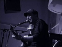 Peter Mulvey and Jeffrey Foucault in Portland, photo by Daniel Temmesfeld, cc 2010