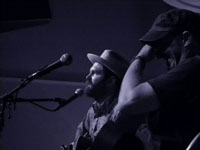 Peter Mulvey and Jeffrey Foucault in Portland, photo by Daniel Temmesfeld, cc 2010