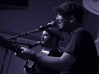 Peter Mulvey and Jeffrey Foucault in Portland, photo by Daniel Temmesfeld, cc 2010