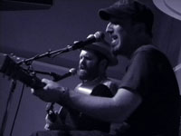 Peter Mulvey and Jeffrey Foucault in Portland, photo by Daniel Temmesfeld, cc 2010