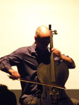 Erik Friedlander plays John Zorn’s Masada Book Two VOLAC, photo by Daniel Temmesfeld, cc 2011