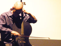 Erik Friedlander plays John Zorn’s Masada Book Two VOLAC, photo by Daniel Temmesfeld, cc 2011