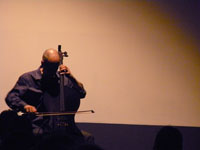 Erik Friedlander plays John Zorn’s Masada Book Two VOLAC, photo by Daniel Temmesfeld, cc 2011