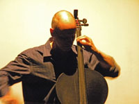 Erik Friedlander plays John Zorn’s Masada Book Two VOLAC, photo by Daniel Temmesfeld, cc 2011