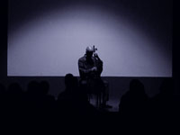 Erik Friedlander plays John Zorn’s Masada Book Two VOLAC, photo by Daniel Temmesfeld, cc 2011