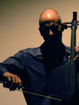 Erik Friedlander plays John Zorn’s Masada Book Two VOLAC, photo by Daniel Temmesfeld, cc 2011